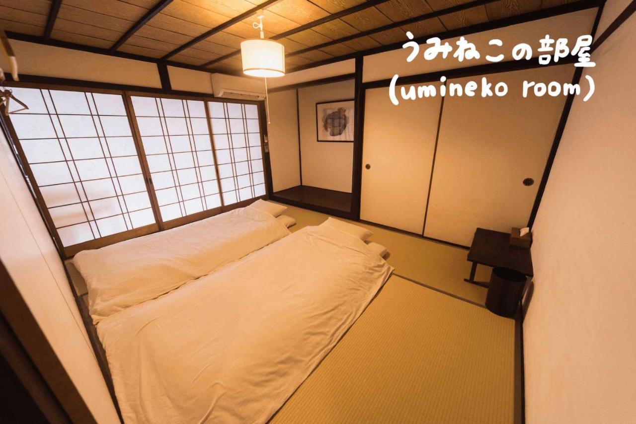 Book & Guesthouse Hitotomaru Toyooka  Bagian luar foto