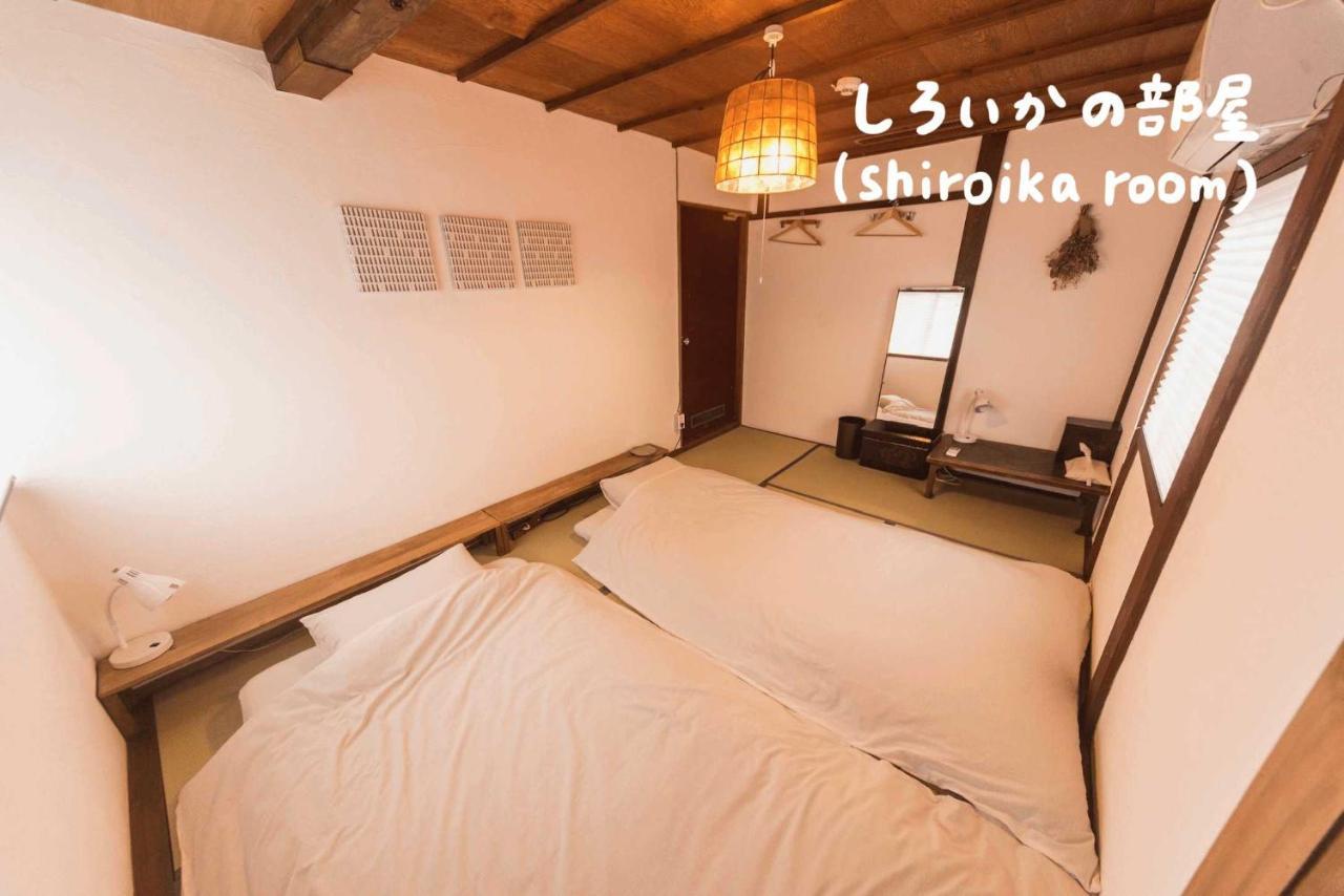 Book & Guesthouse Hitotomaru Toyooka  Bagian luar foto