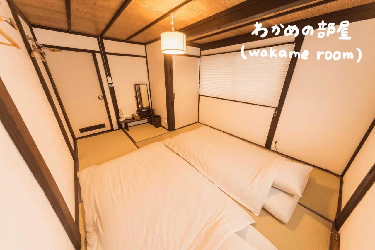 Book & Guesthouse Hitotomaru Toyooka  Bagian luar foto