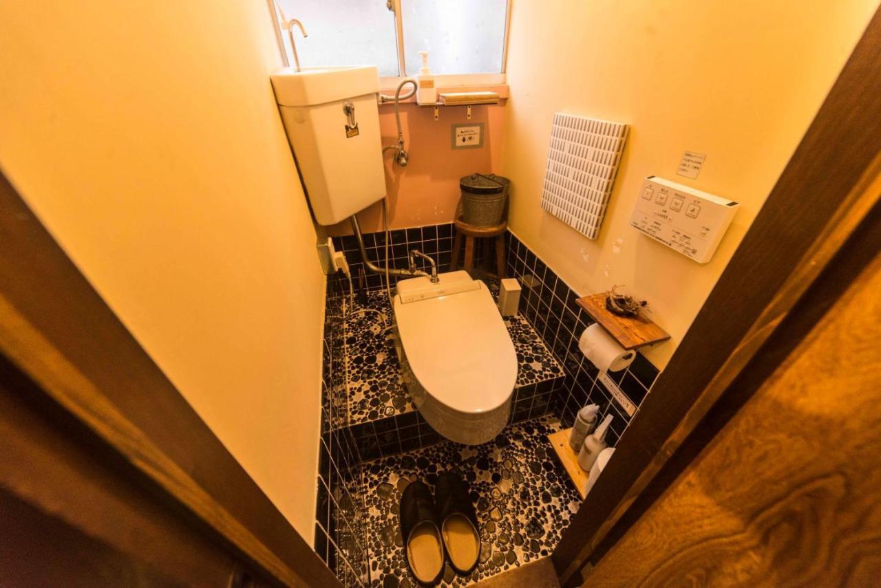 Book & Guesthouse Hitotomaru Toyooka  Bagian luar foto