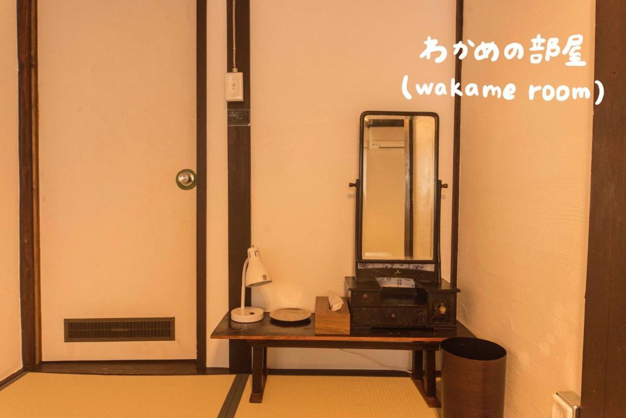 Book & Guesthouse Hitotomaru Toyooka  Bagian luar foto