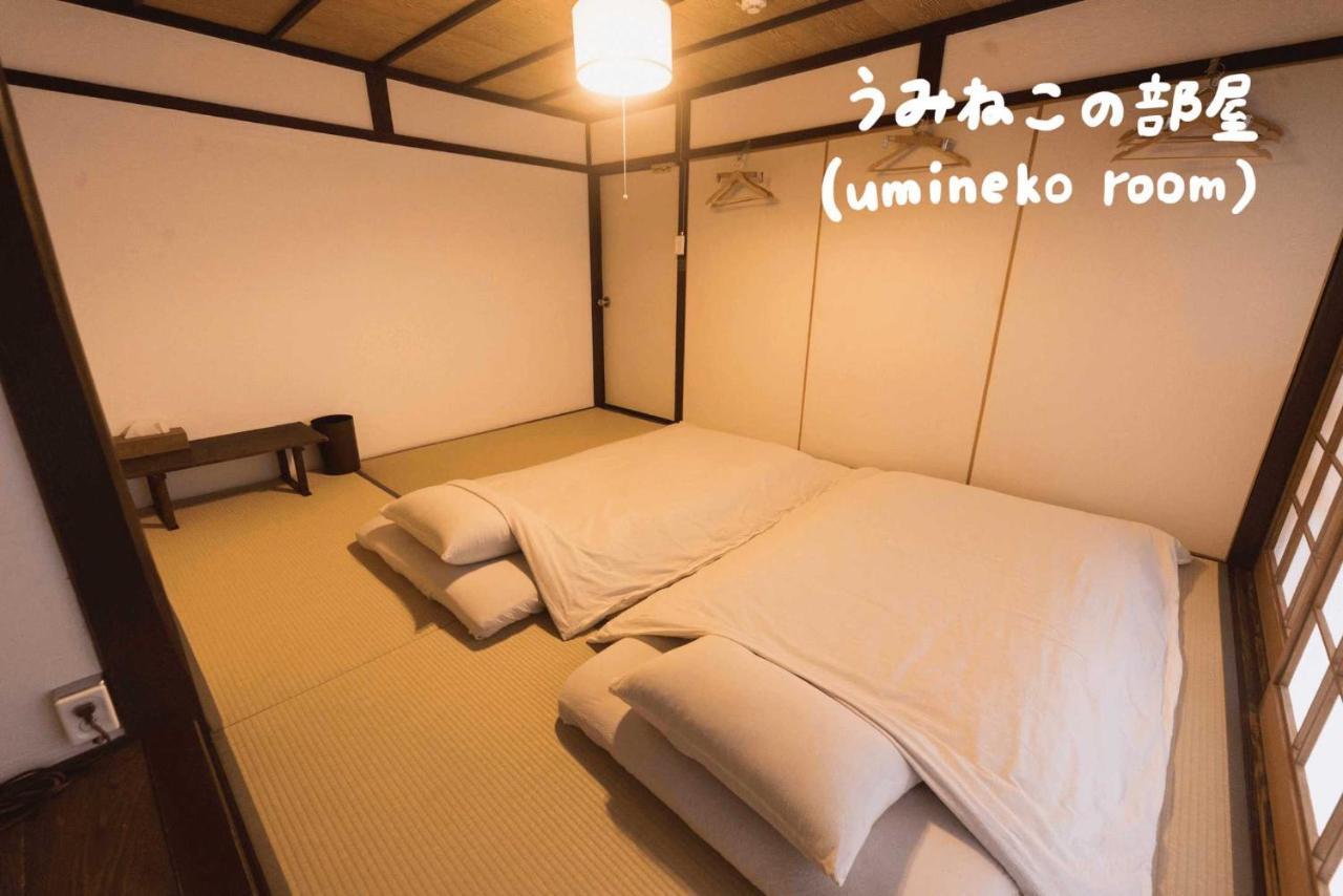 Book & Guesthouse Hitotomaru Toyooka  Bagian luar foto